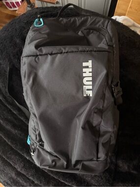 Thule Black Camera Backpack with Teal Accents
